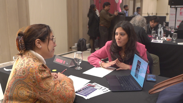 A portfolio review in progress at Portfolio Night Delhi 2025